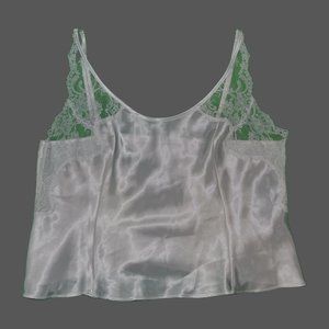 pearl white victoria’s secret cami with lace details.